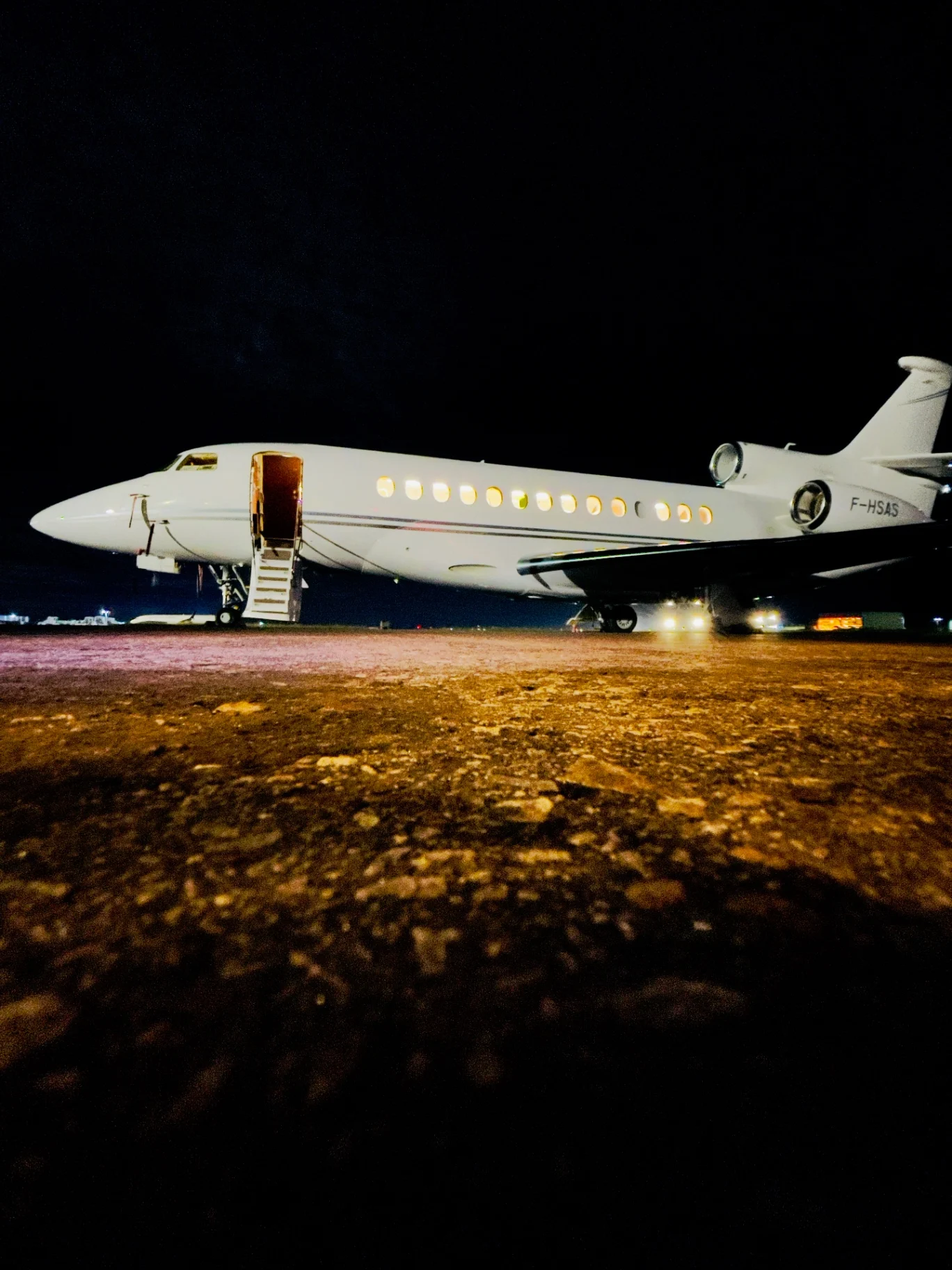 Dassault Falcon 7X lit up at night