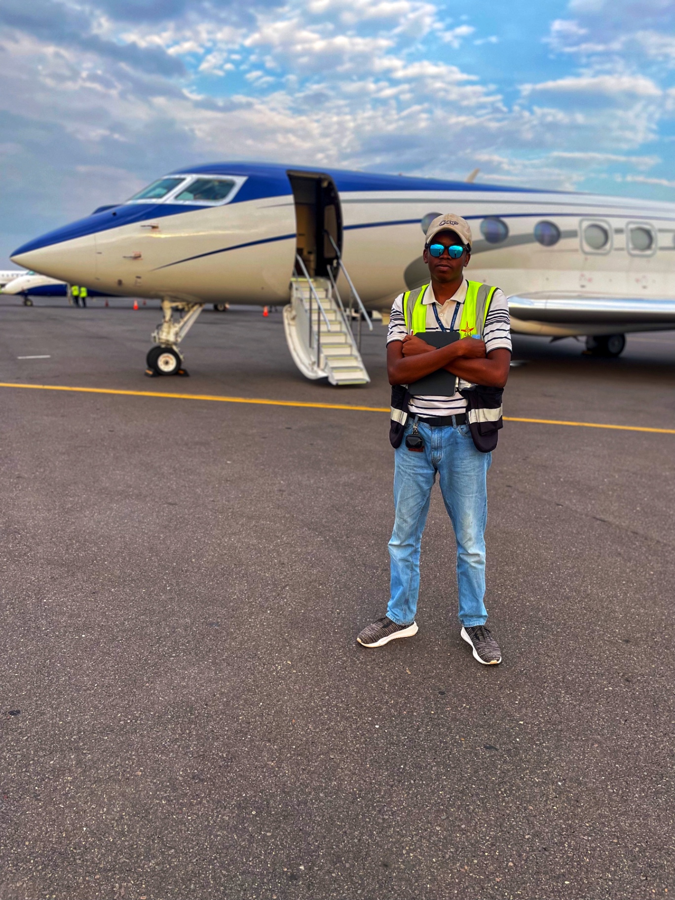 G.A.S. handler posing in front of Gulfstream